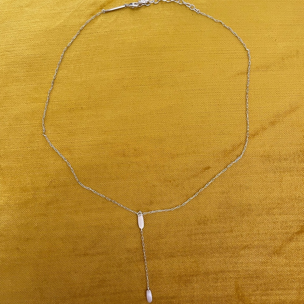 Kendra Scott: Gold toned “Y” necklace.